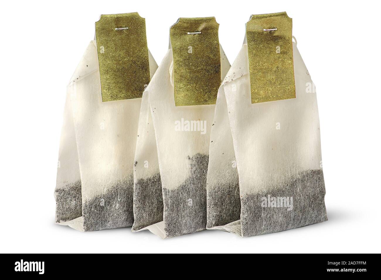 Three tea bags with labels Stock Photo Alamy