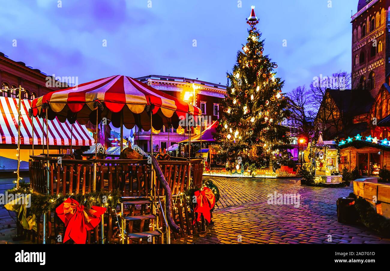 Latvian Lutheran Church Christmas Fair 2022 Carousel At Christmas Market On Dome Square Xmas Tree Riga Reflex Stock  Photo - Alamy