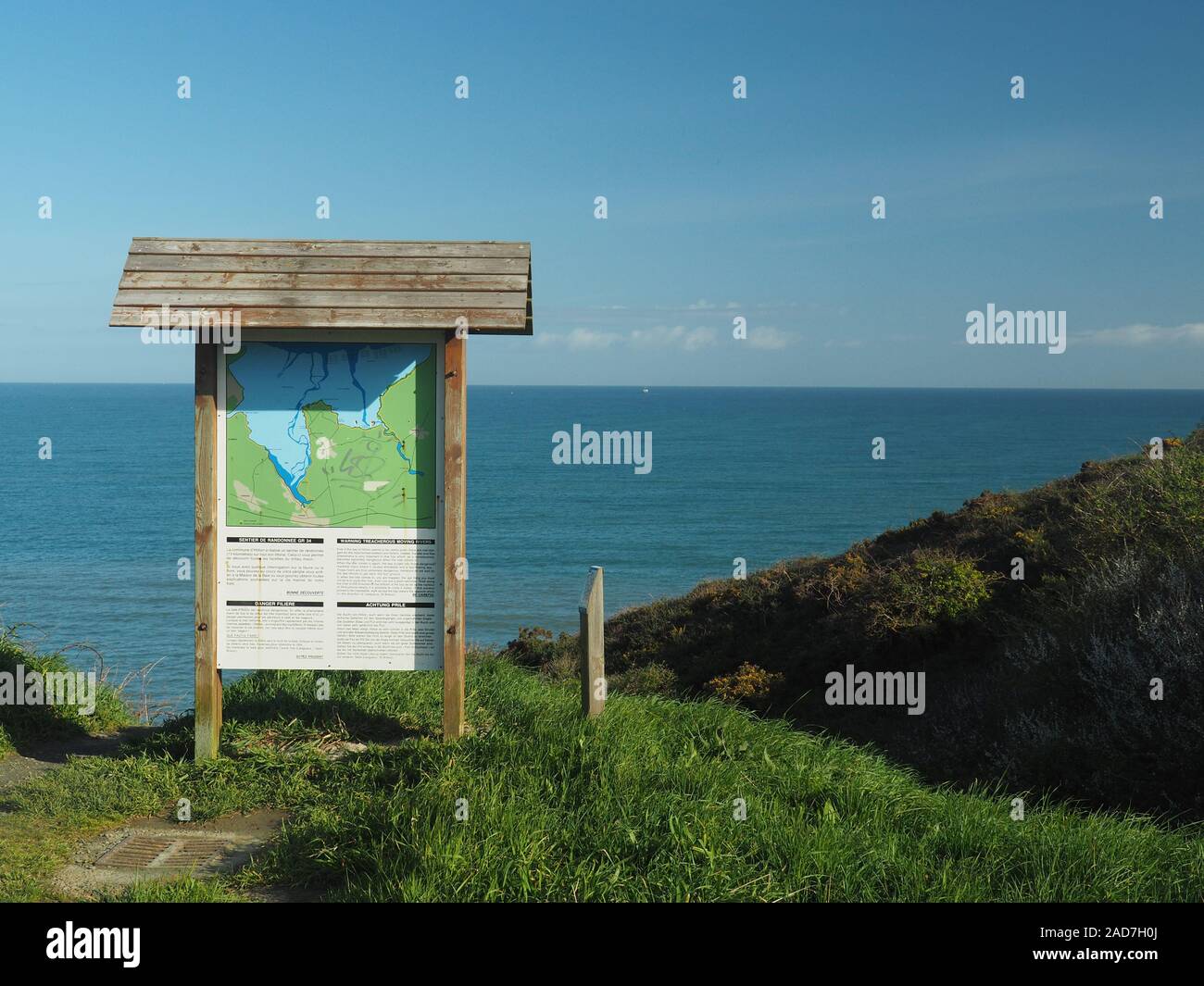 Bay of Hillion, France, Normandy, - Warning sign for low tide and high tide Stock Photo