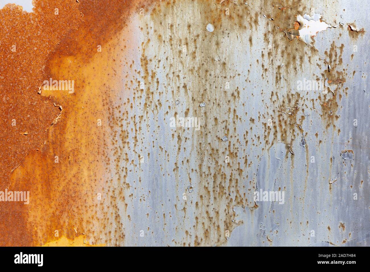 Rusty metal with chipped paint as background Stock Photo