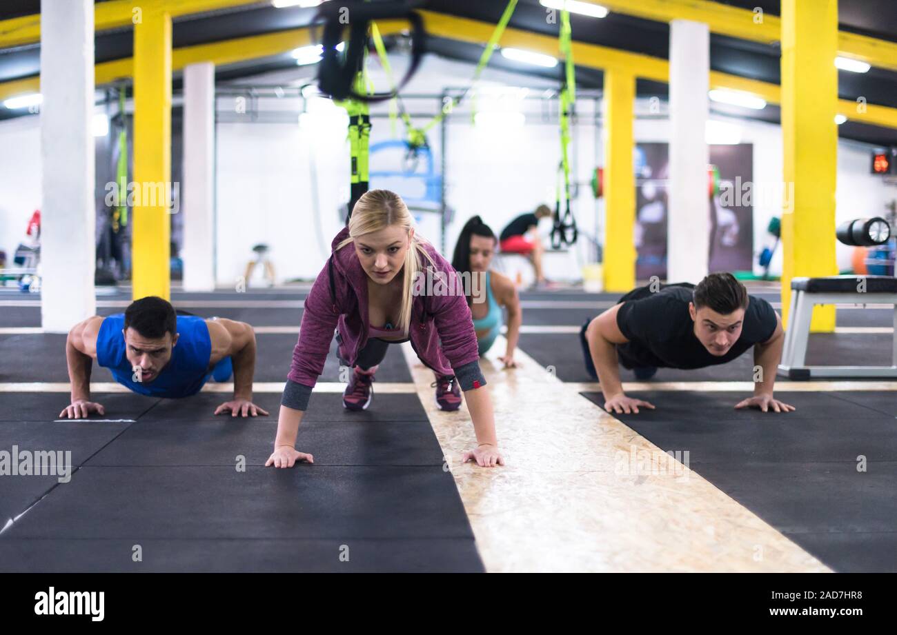 Group people doing pushups hi-res stock photography and images - Alamy