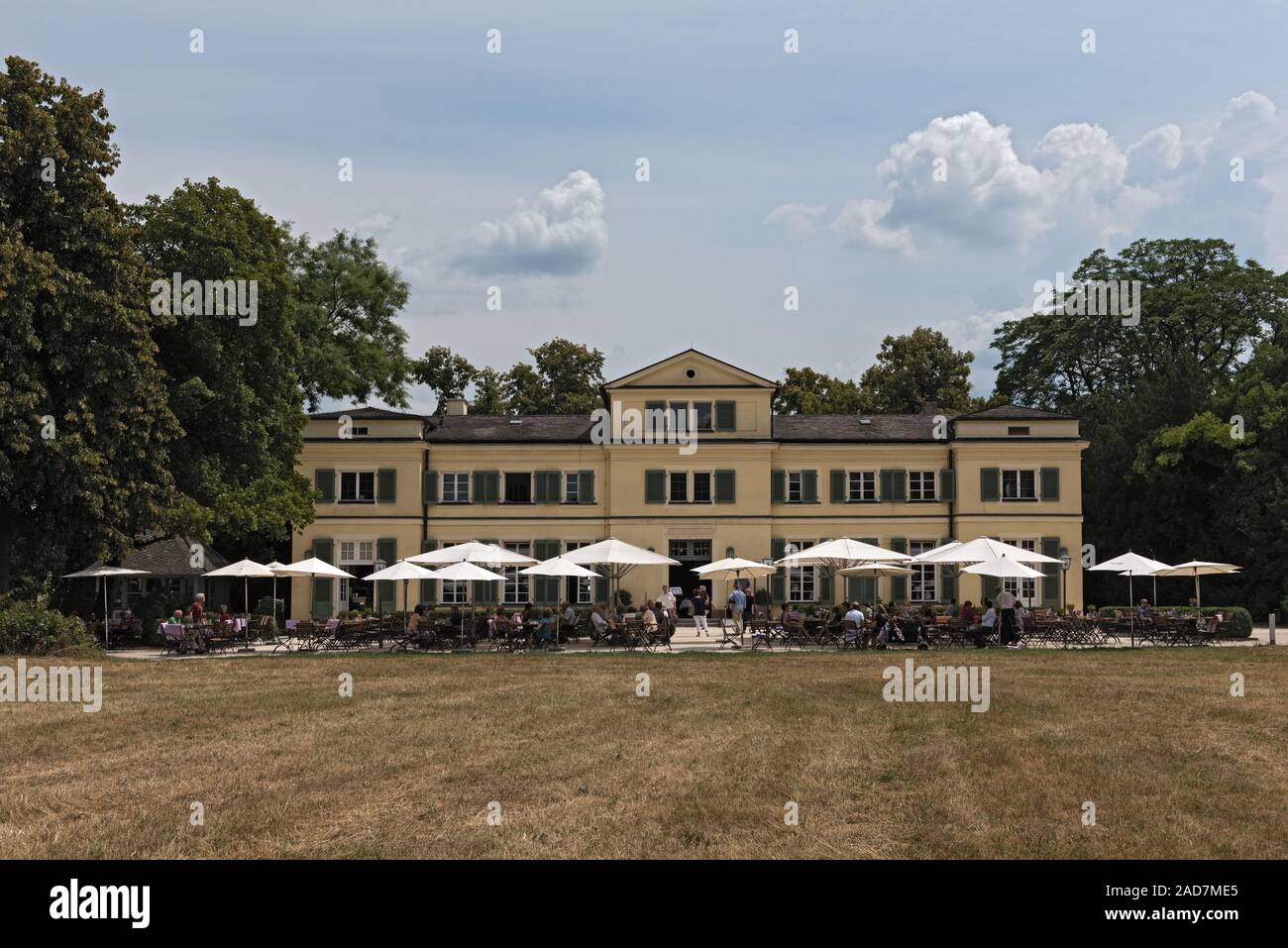guests on the terrace in front of the restaurant in the historic park Schoenbusch, Aschaffenburg, Ge Stock Photo