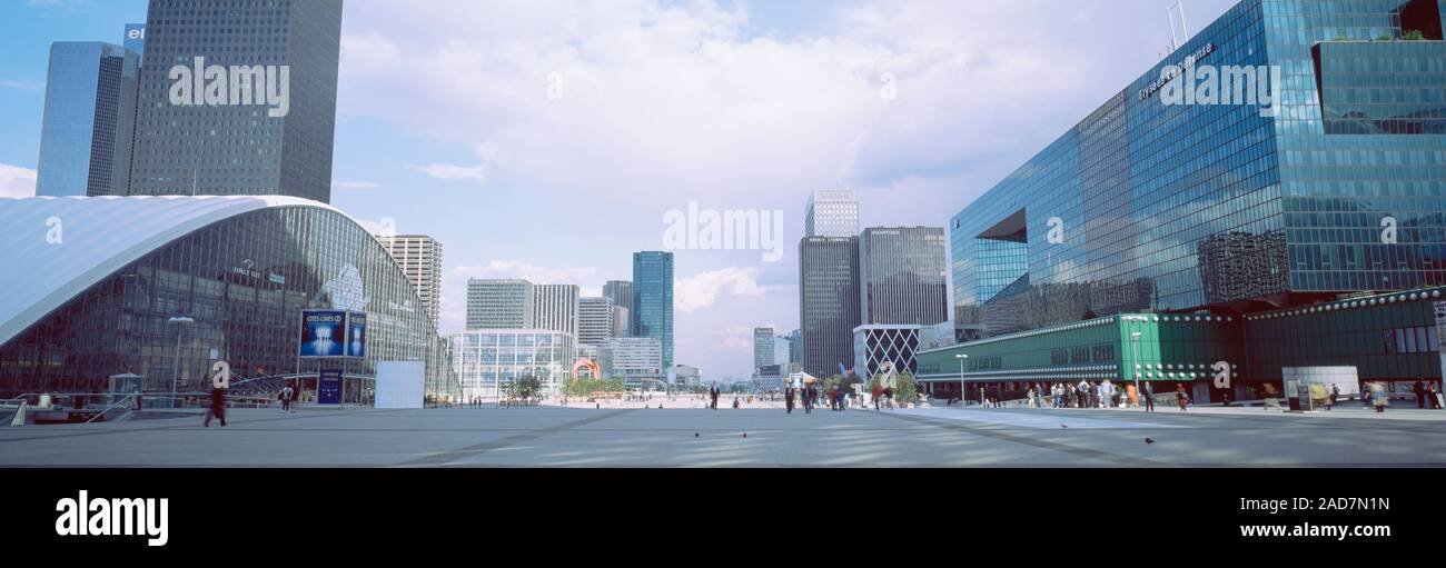 Group of people walking on a road, La Defense, Paris, France Stock Photo