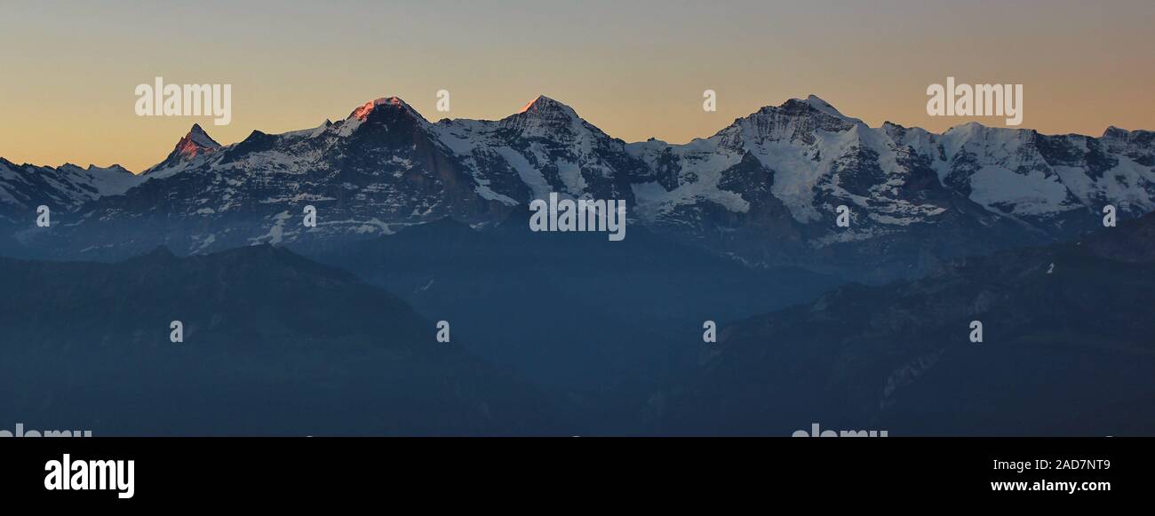 Famous mountains Eiger, Monch and Jungfrau at sunrise Stock Photo - Alamy