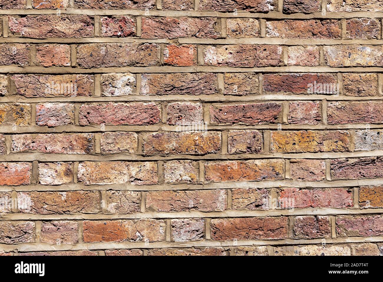 Background from a rough and worn red brick wall Stock Photo