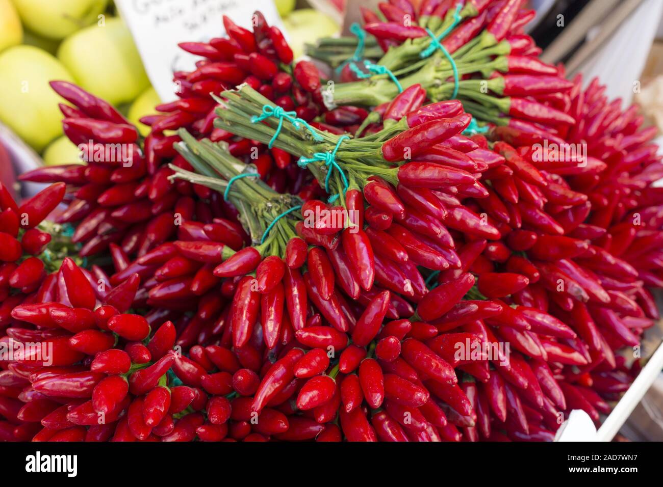 Fresh pepperoni in bundles on a market Stock Photo Alamy