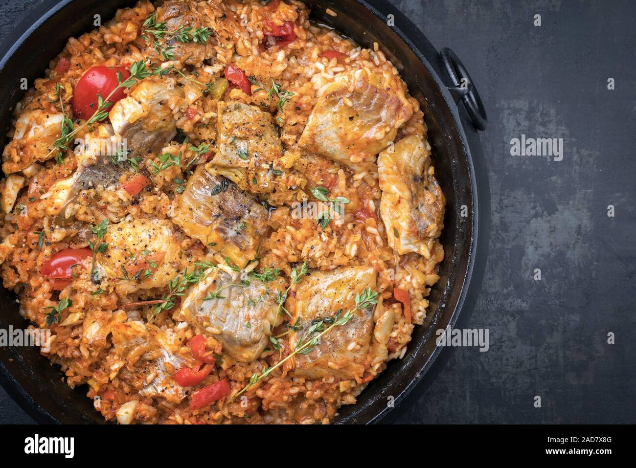 Traditional Louisiana fish jambalaya dish creole cajun with rice and