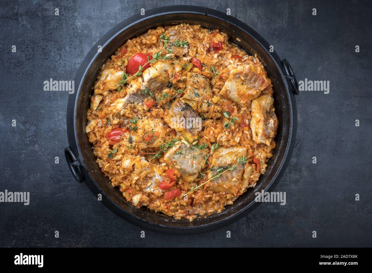 Traditional Louisiana fish jambalaya dish creole cajun with rice and