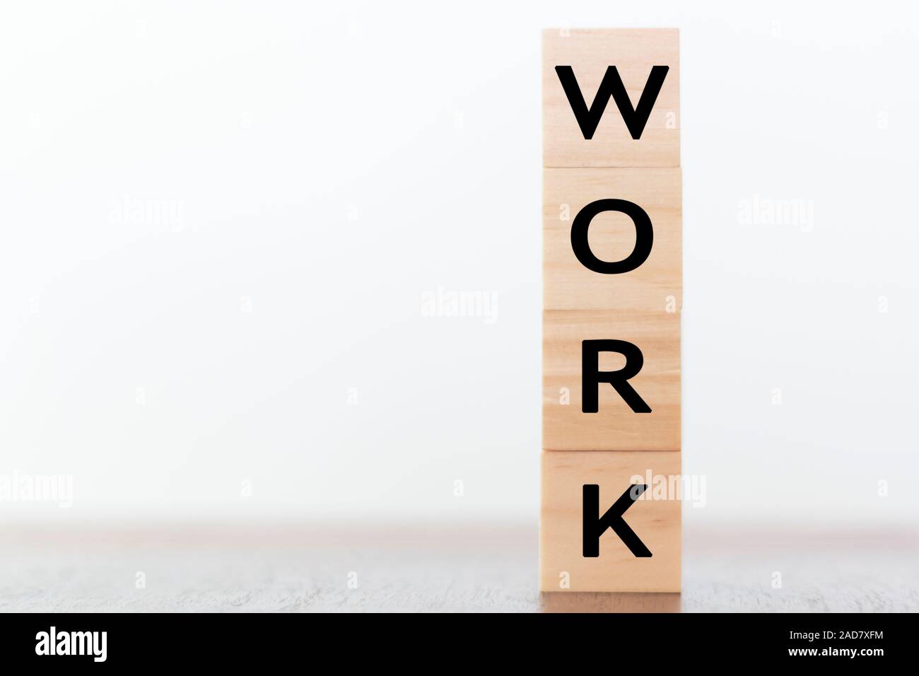 Work word written on wooden cubes with copy space Stock Photo