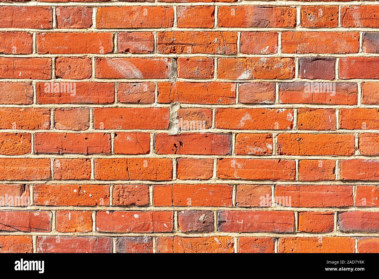 Background from a well saturated orange brickwall Stock Photo