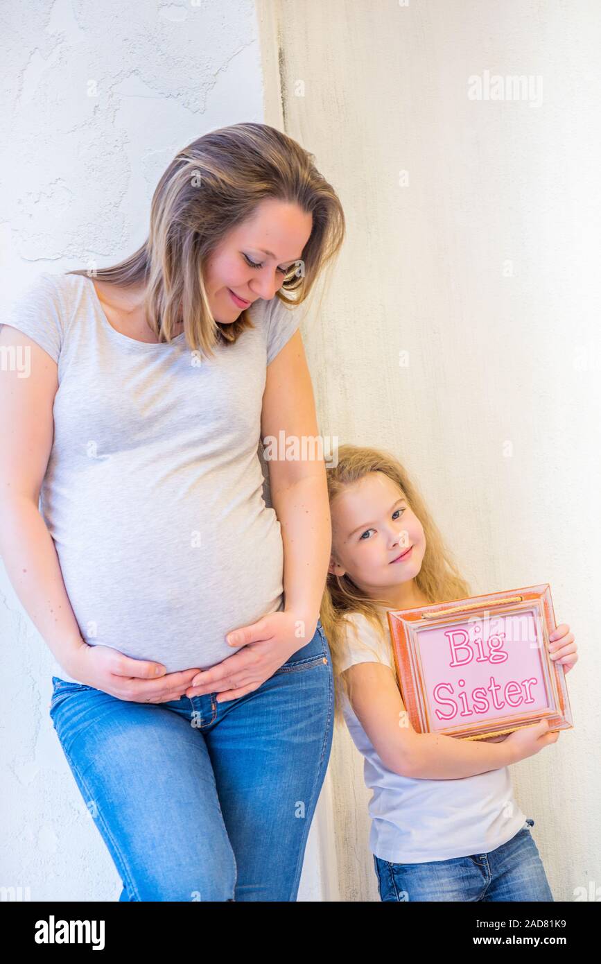 Pregnant tummy standing hi-res stock photography and images - Alamy