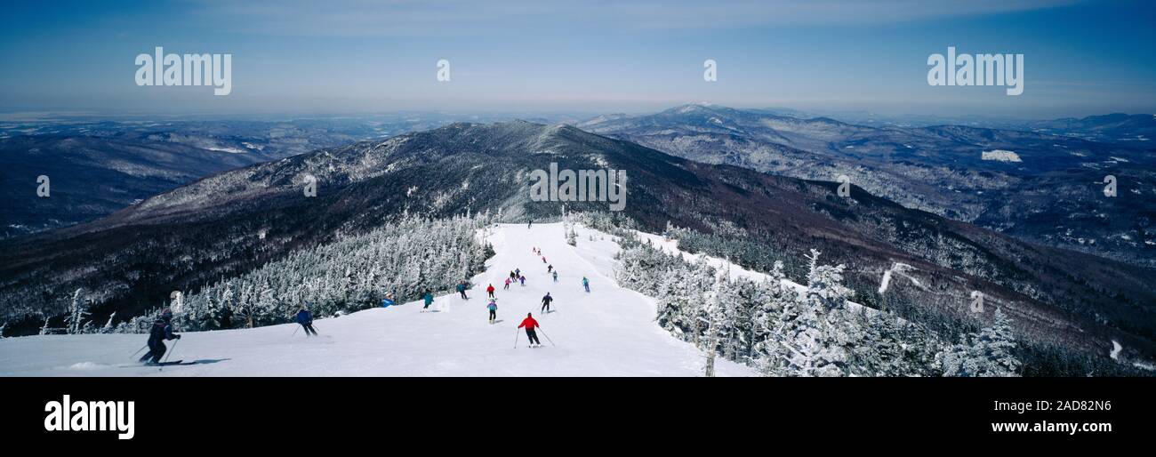 Aerial view of a group of people skiing downhill, Sugarbush Resort, Vermont, USA Stock Photo