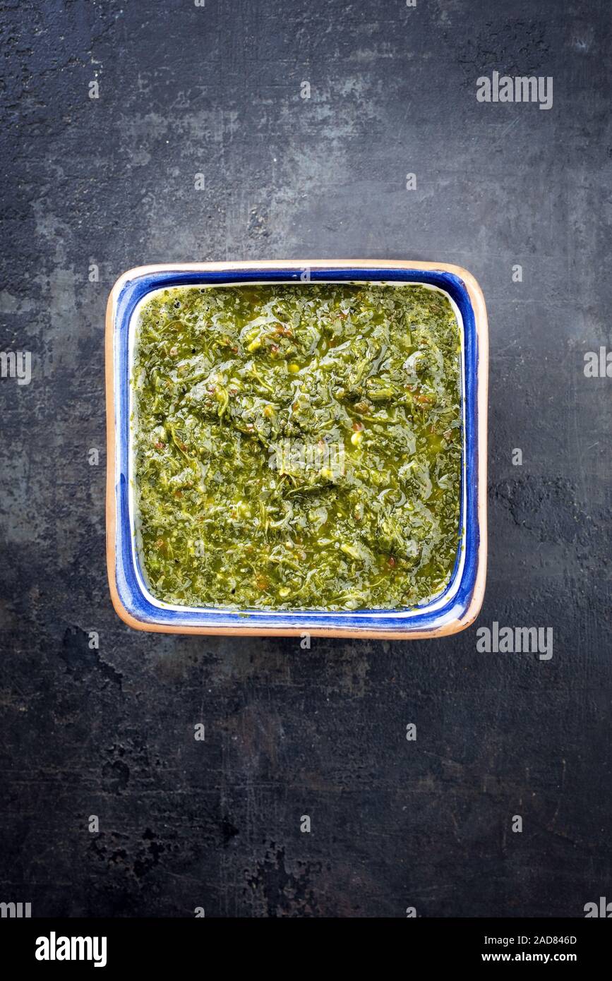 Traditional Columbian chimichurri sauce aji criollo with chili Stock Photo