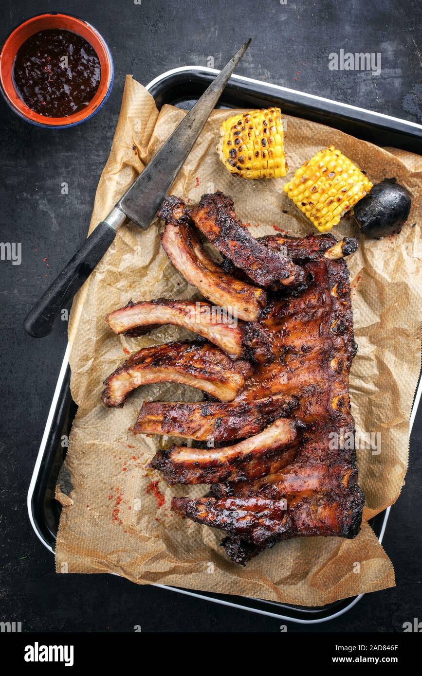 Barbecue spare ribs St Louis cut with hot honey chili marinade and corn ...