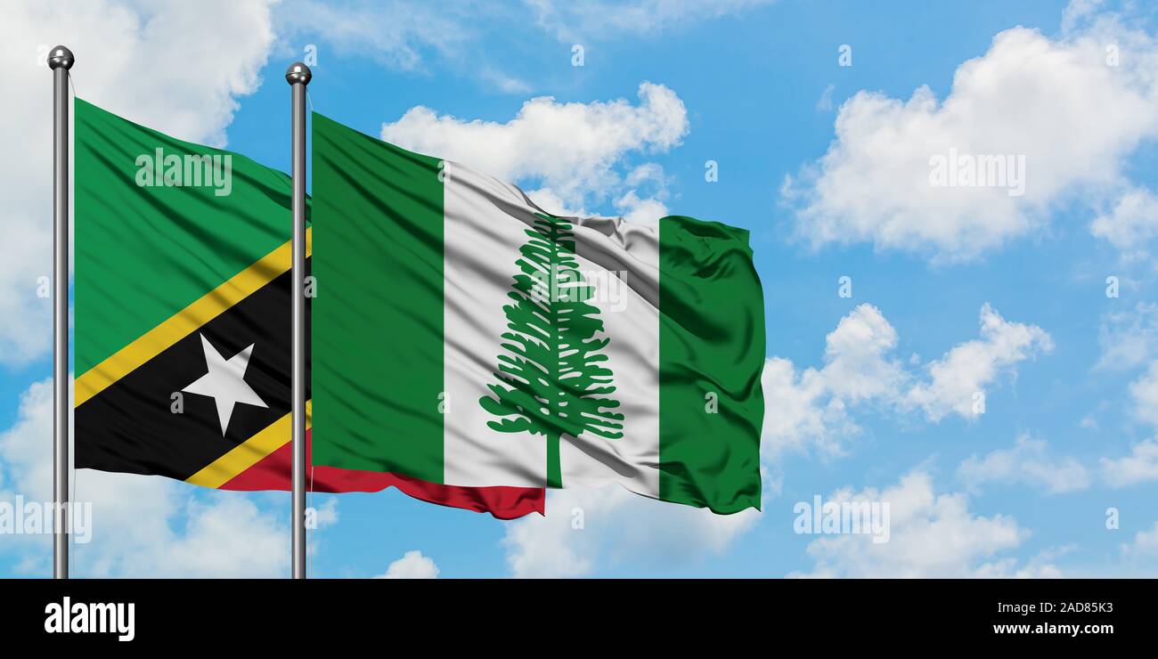 Saint Kitts And Nevis And Norfolk Island Flag Waving In The Wind Against White Cloudy Blue Sky Together Diplomacy Concept International Relations Stock Photo Alamy Saint Kitts And Nevis And Norfolk Island Flag Waving In The Wind Against White Cloudy Blue Sky Together Diplomacy Concept International Relations Stock Photo Alamy