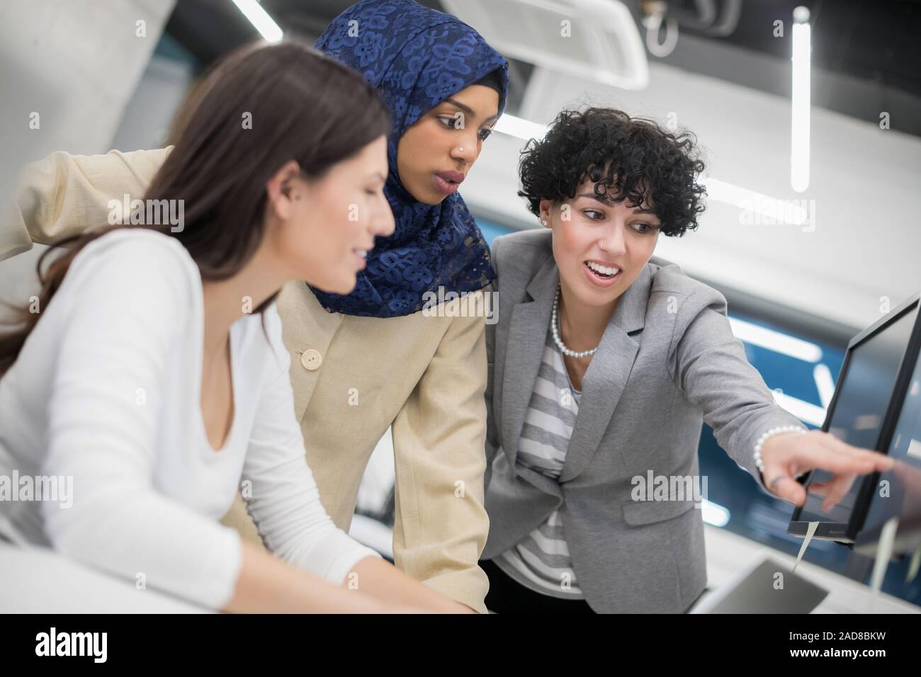 multiethnics team of software developers working together Stock Photo