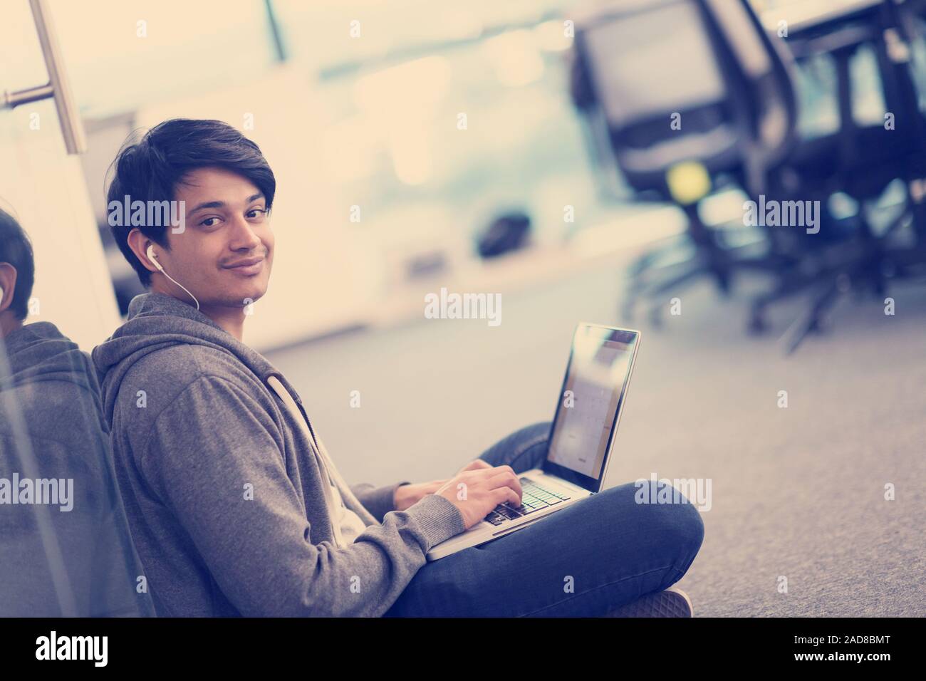 software developer working on the floor Stock Photo