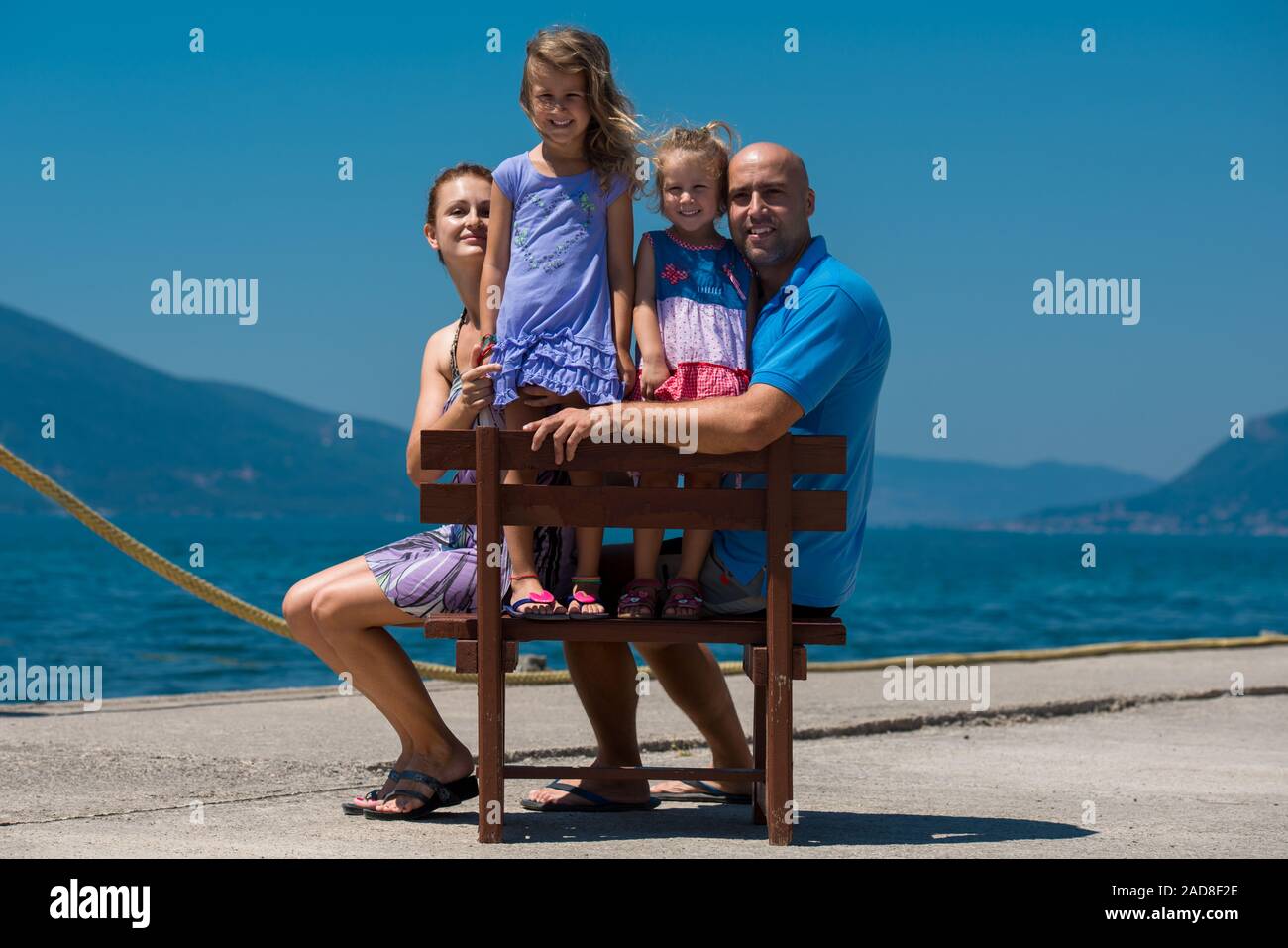 Happy family by the sea hi-res stock photography and images - Alamy