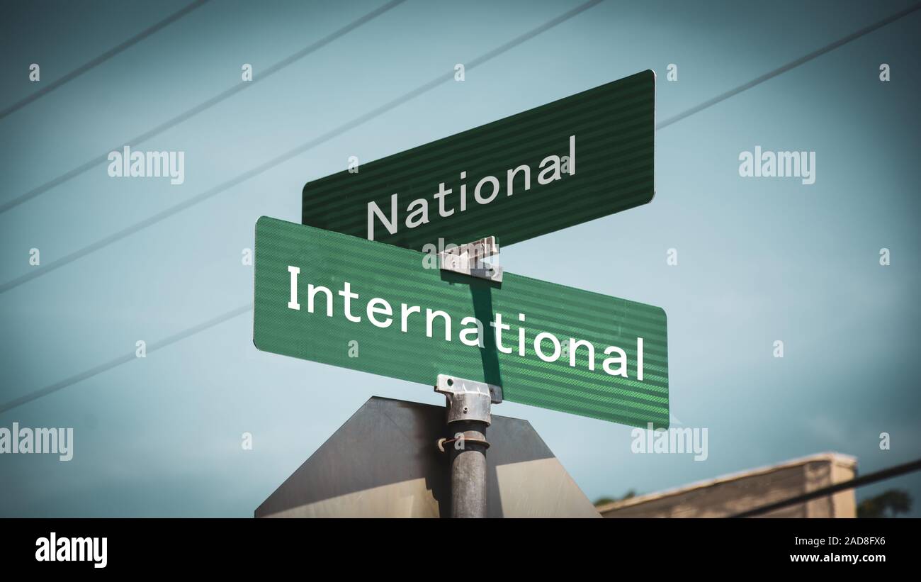 Street Sign International versus National Stock Photo