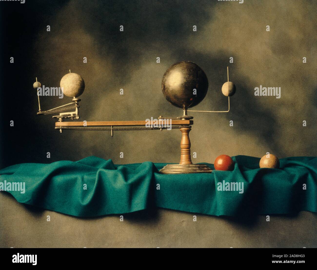 Still life photograph with antique solar system model Stock Photo