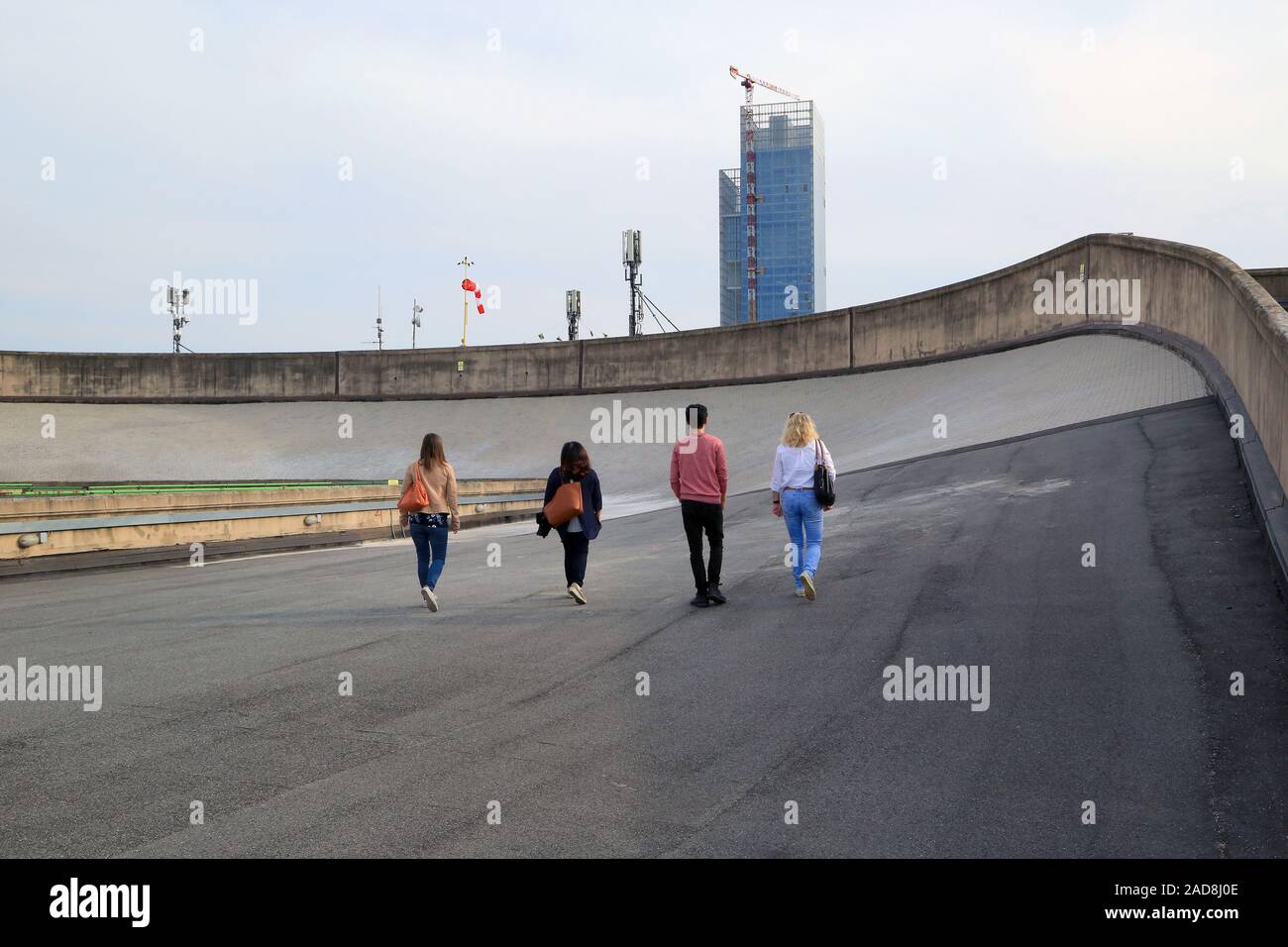 Turin, Italy, persons on the former test track on the roof of the factory Fiat Lingotto Stock Photo