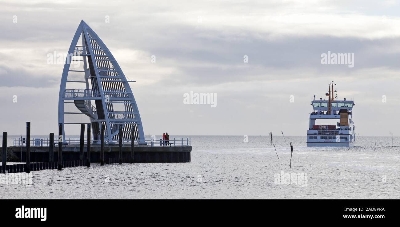 Observation tower at the harbour and departing ship, landmark, Juist Island, Germany, Europe Stock Photo