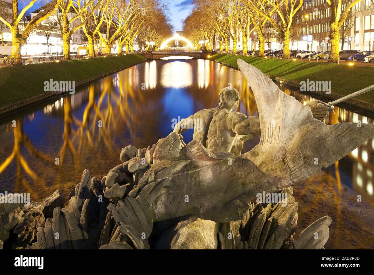 Triton fountain at Koenigsallee in the evening, Duesseldorf, North Rhine-Westphalia, Germany, Europe Stock Photo
