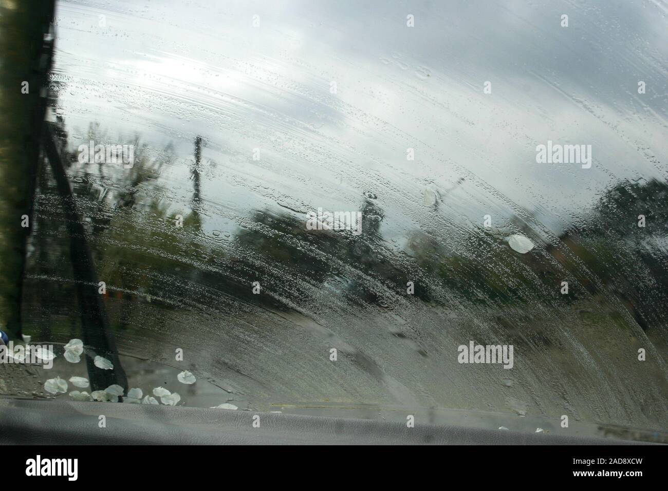 Driving in a rainy day. Wipers cleaning the windshield Stock Photo Alamy