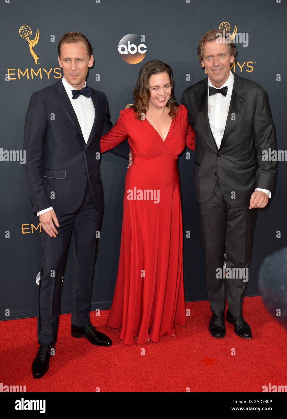 LOS ANGELES, CA. September 18, 2016: Actors Tom Hiddleston, Olivia Coleman & Hugh Laurie at the 68th Primetime Emmy Awards at the Microsoft Theatre L.A. Live. © 2016 Paul Smith / Featureflash Stock Photo