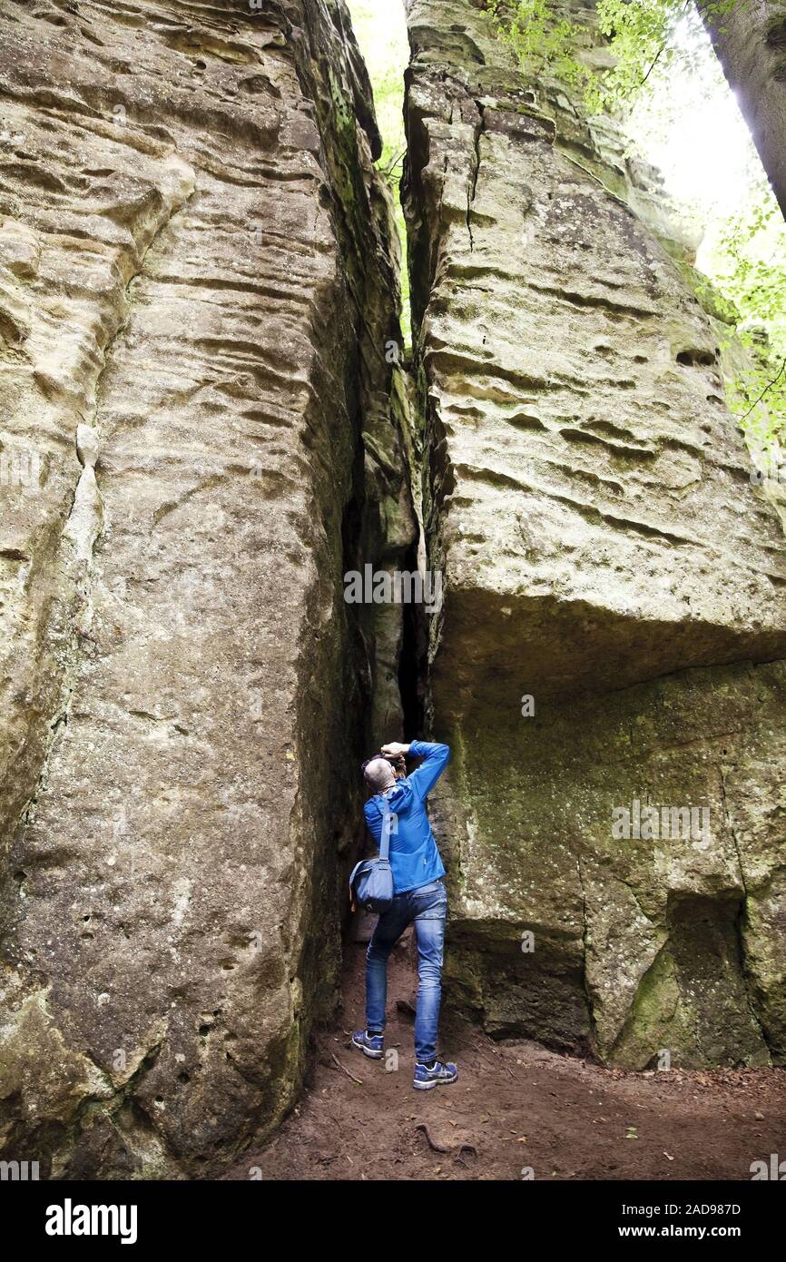 man taking photos in the Devil´s Gorge in the South Eifel Nature Park, Irrel, Eifel, Germany, Europe Stock Photo