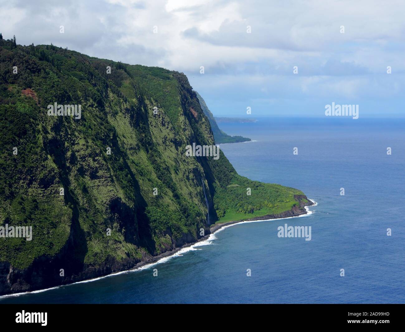 Waipi'o Black Sand Beach South.  Located on the northern Hamakua Coast, the sacred Waipio Valley was the boyhood home of King Kamehameha I, and an imp Stock Photo