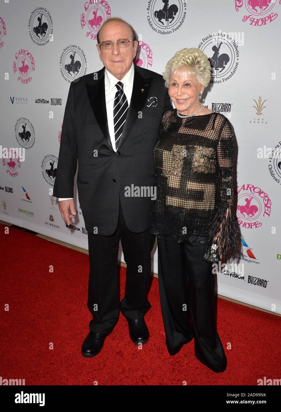 BEVERLY HILLS, CA. October 8, 2016: Clive Davis & Wife at the 2016 Carousel of Hope Ball at the Beverly Hilton Hotel. © 2016 Paul Smith / Featureflash Stock Photo