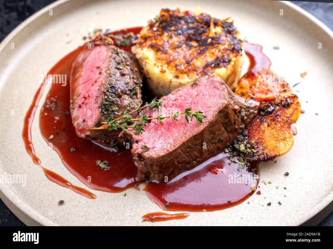 Traditional saddle of venison with Swiss rösti Stock Photo Alamy