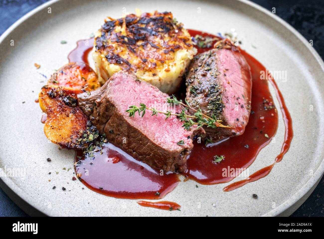 Traditional saddle of venison with Swiss rösti Stock Photo Alamy