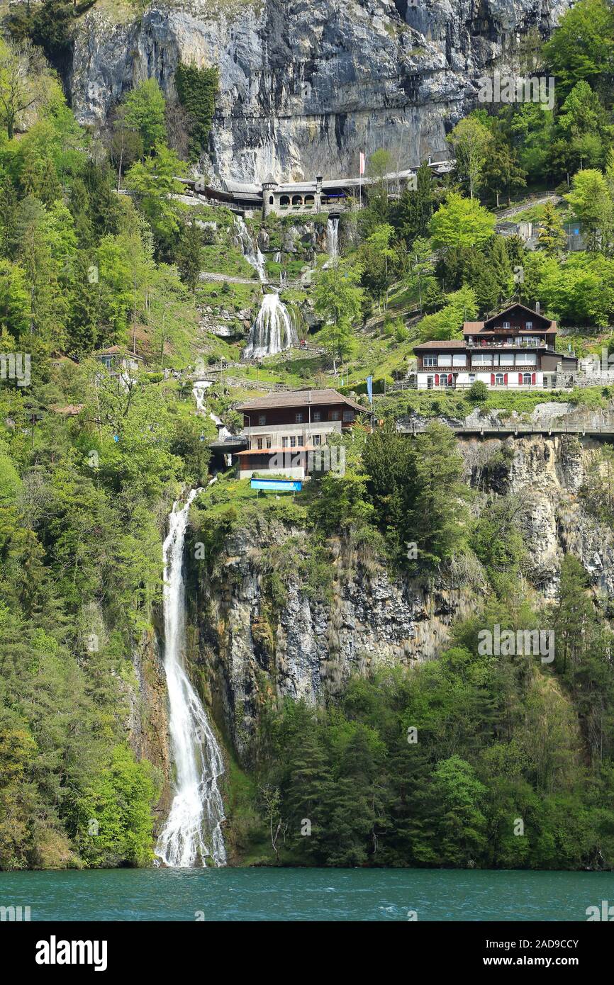 St. Beatus caves and lake road on the shore rocks near Beatenberg on Lake Thun, Switzerland Stock Photo