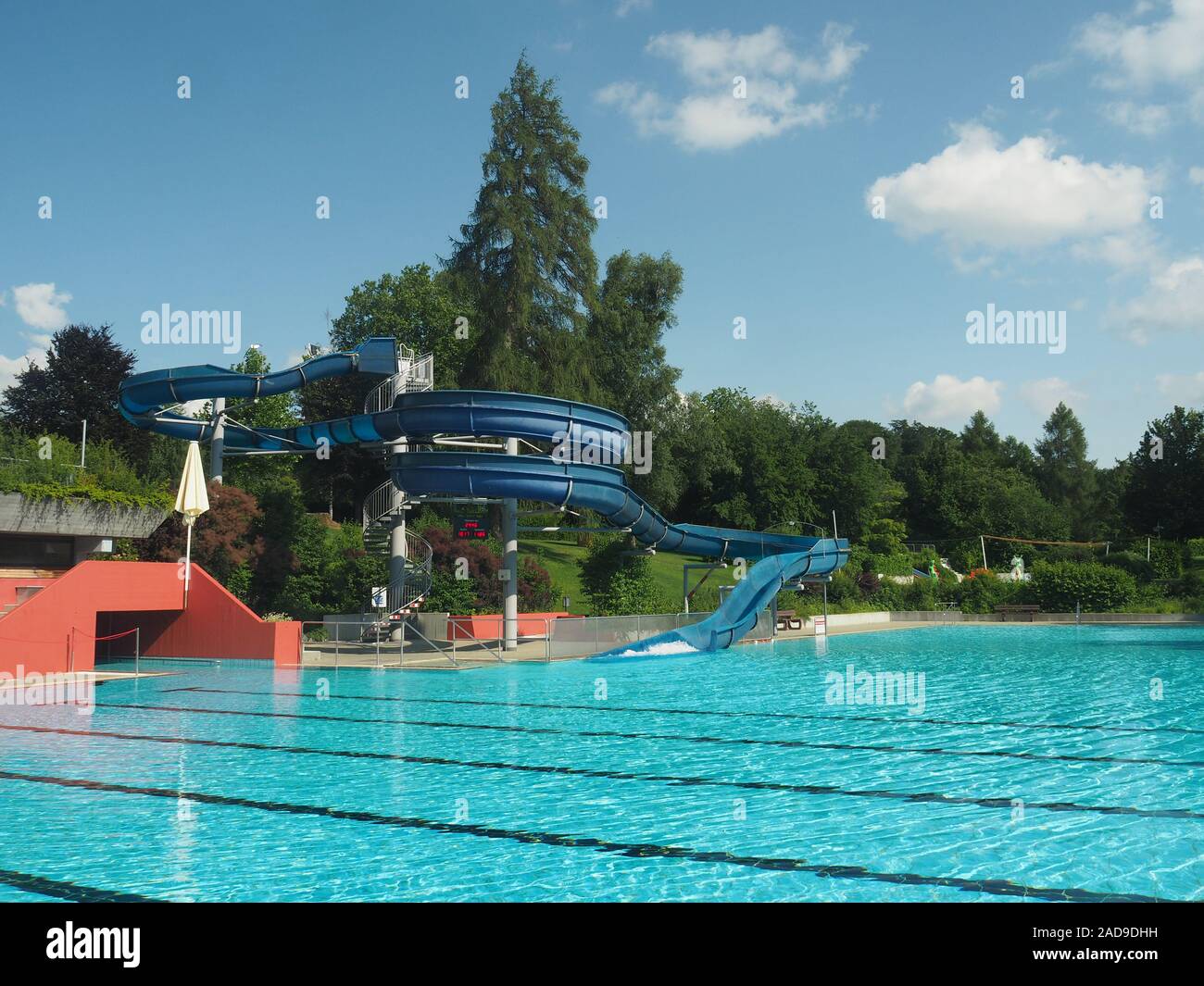 Municipal outdoor pool with waterslide Stock Photo