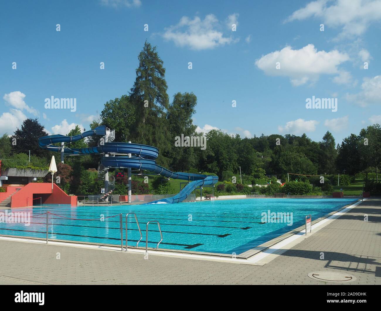 Outdoor Pool with water slide Stock Photo