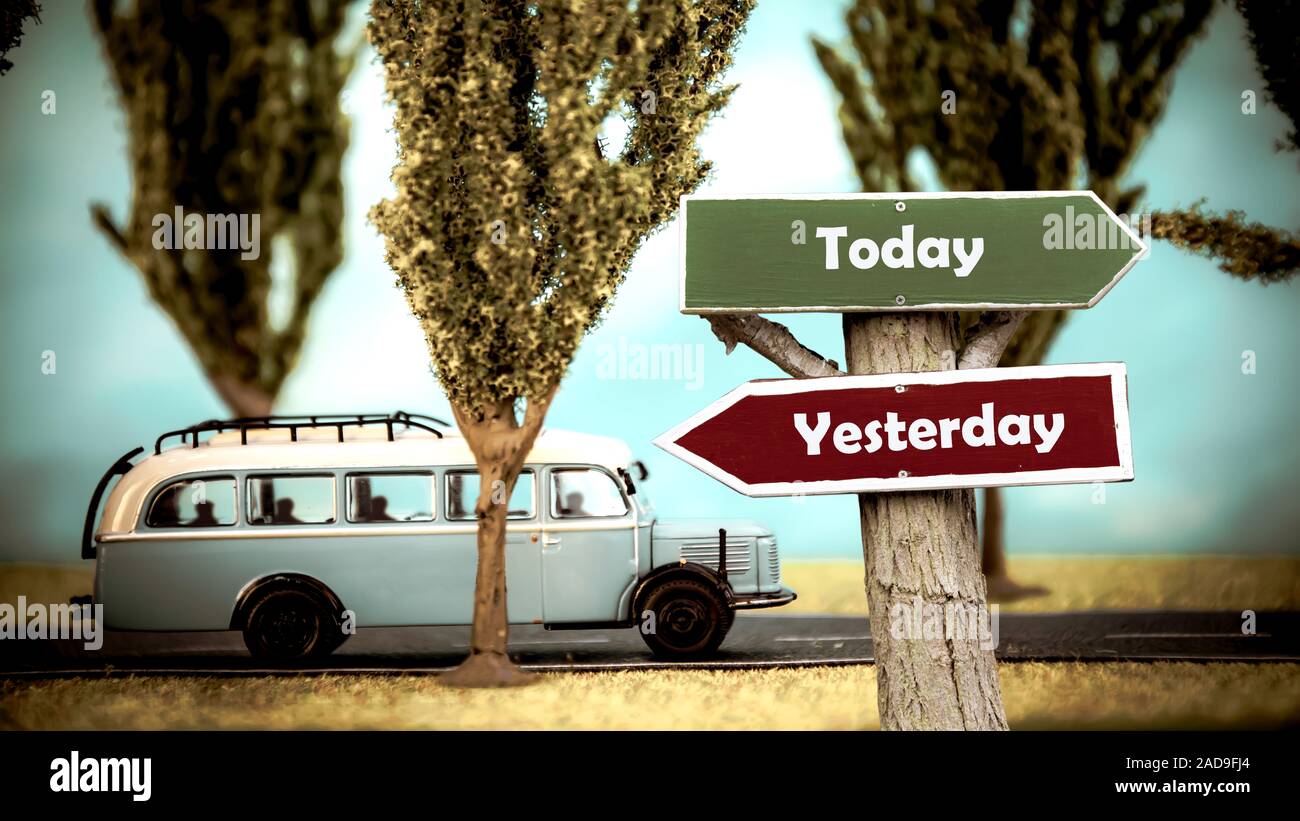 Wall Sign Today versus Yesterday Stock Photo - Alamy