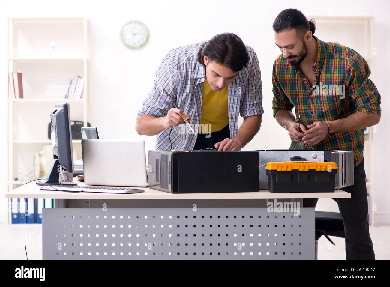 IT engineers working on hardware issue Stock Photo