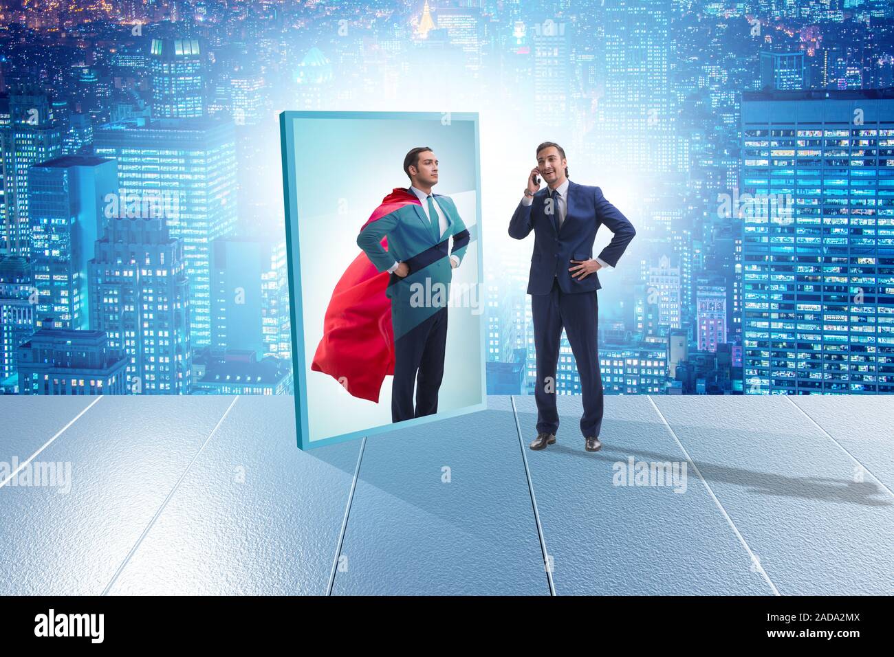 Businessman seeing himself in mirror as superhero Stock Photo - Alamy