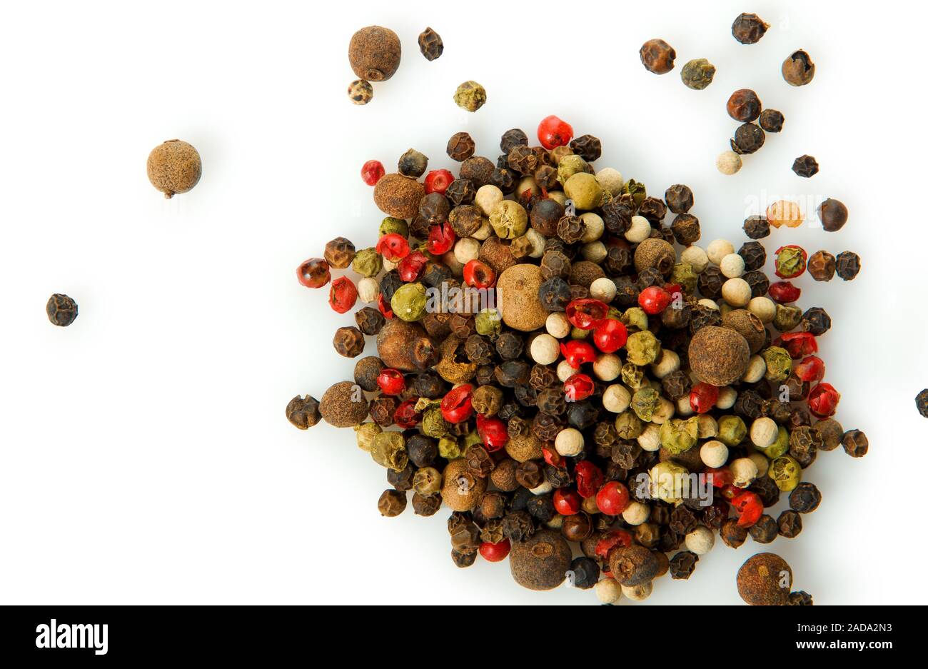 Mixture of peppers texture. View from above. Seasoning background. Spice sprinkled. Stock Photo