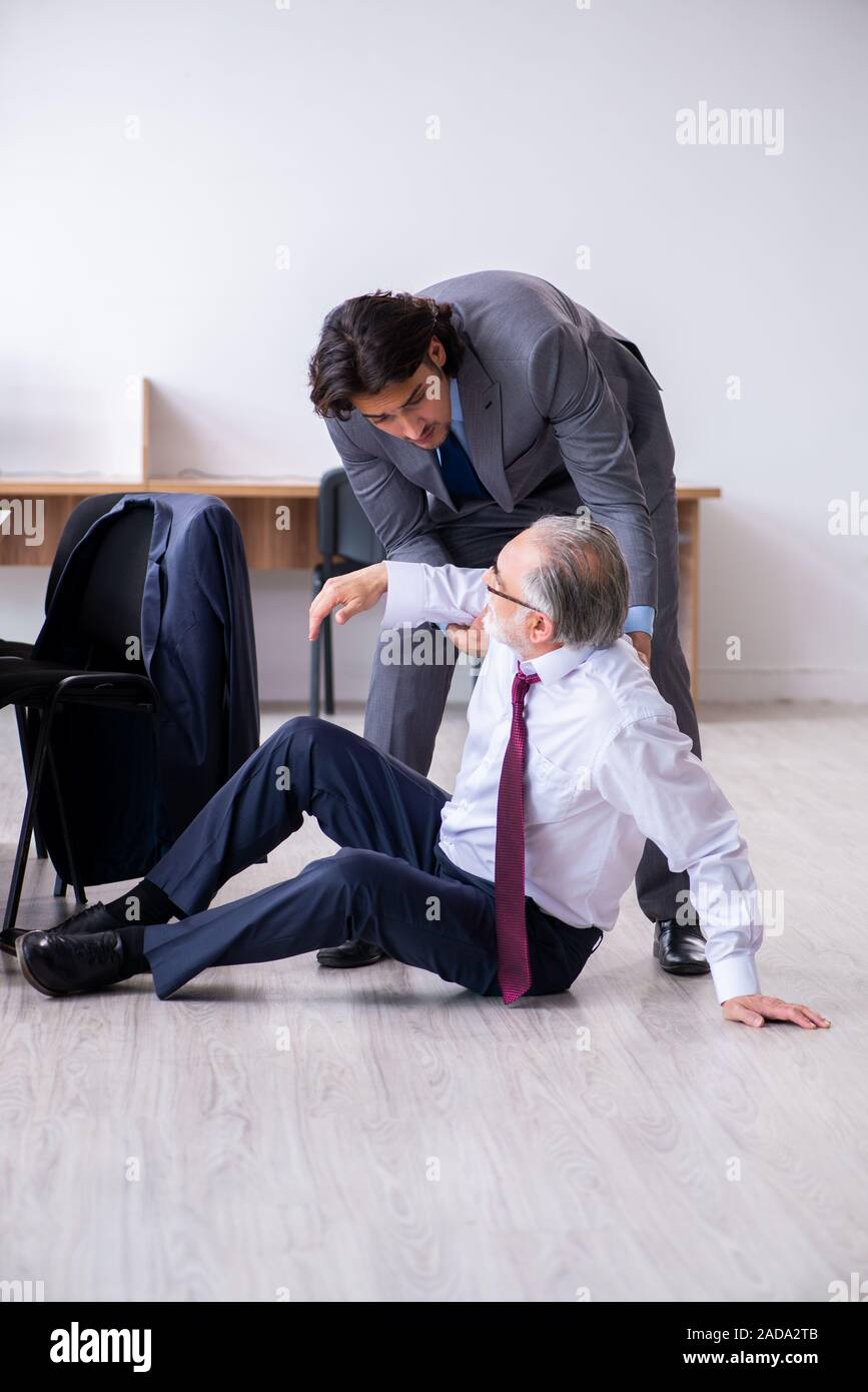 Male employee suffering from heart attack in the office Stock Photo Alamy