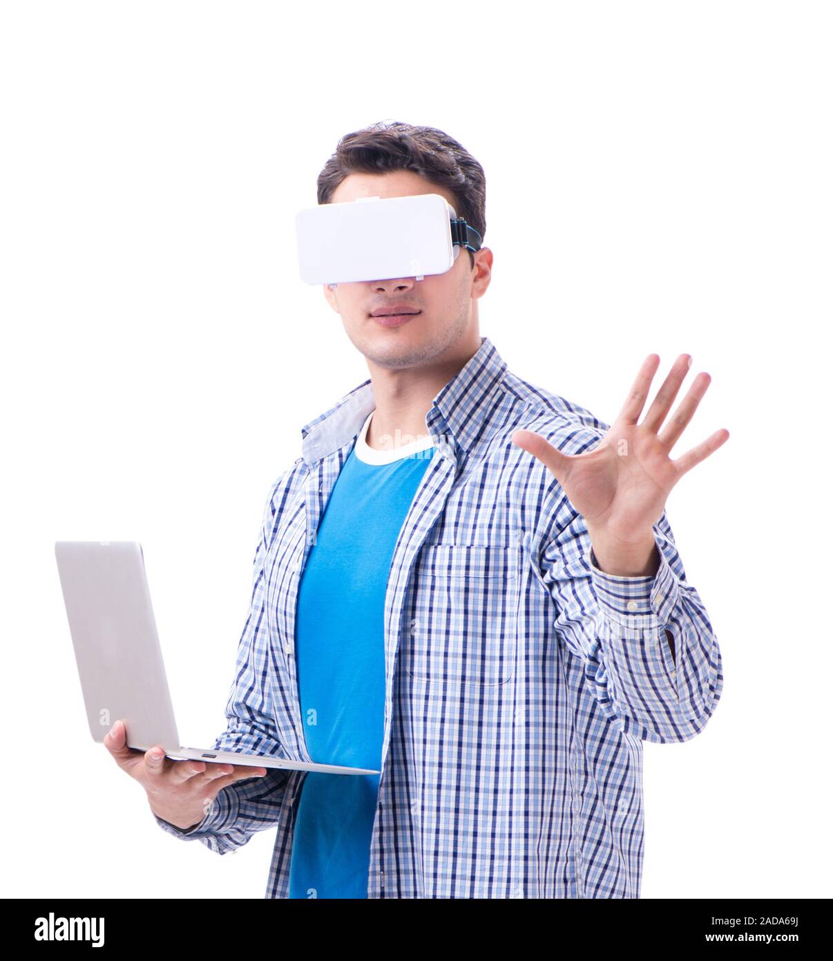 Young man wearing virtual reality VR glasses Stock Photo - Alamy
