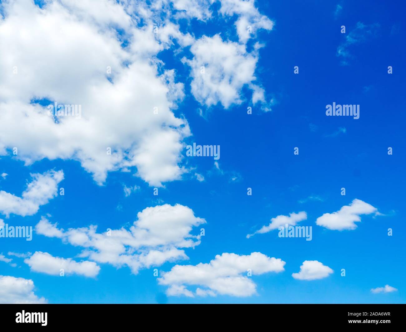 Blue sky with many clouds background with space. Stock Photo