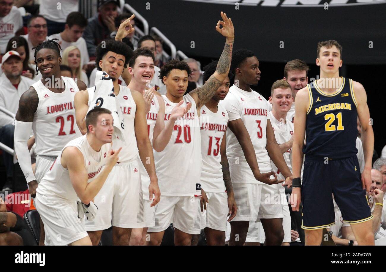 Louisville, United States. 03rd Dec, 2019. Louisville Cardinals players celebrate on the bench during their game against Michigan Wolverines at KFY Yum! Center in Louisville, Kentucky, December 3, 2019. Photo by John Sommers II /UPI Credit: UPI/Alamy Live News Stock Photo