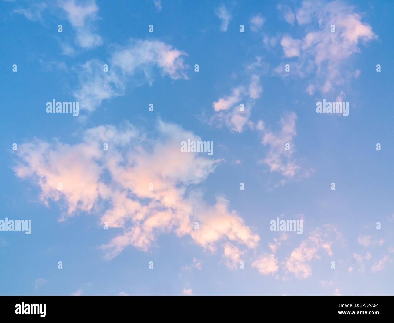 Beautiful golden clouds on sunset sky background. Blue sky background ...
