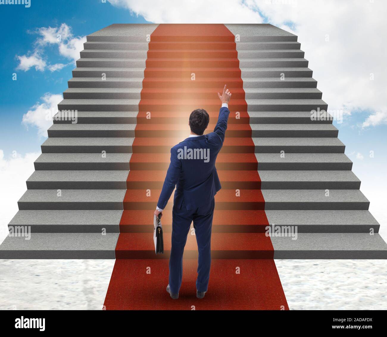 Young Businessman climbing stairs and red carpet into sky Stock Photo ...