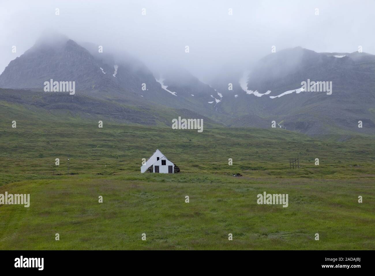 abandoned house in bad weather, Mjoifjoerdur, East Iceland, Iceland, Europe Stock Photo