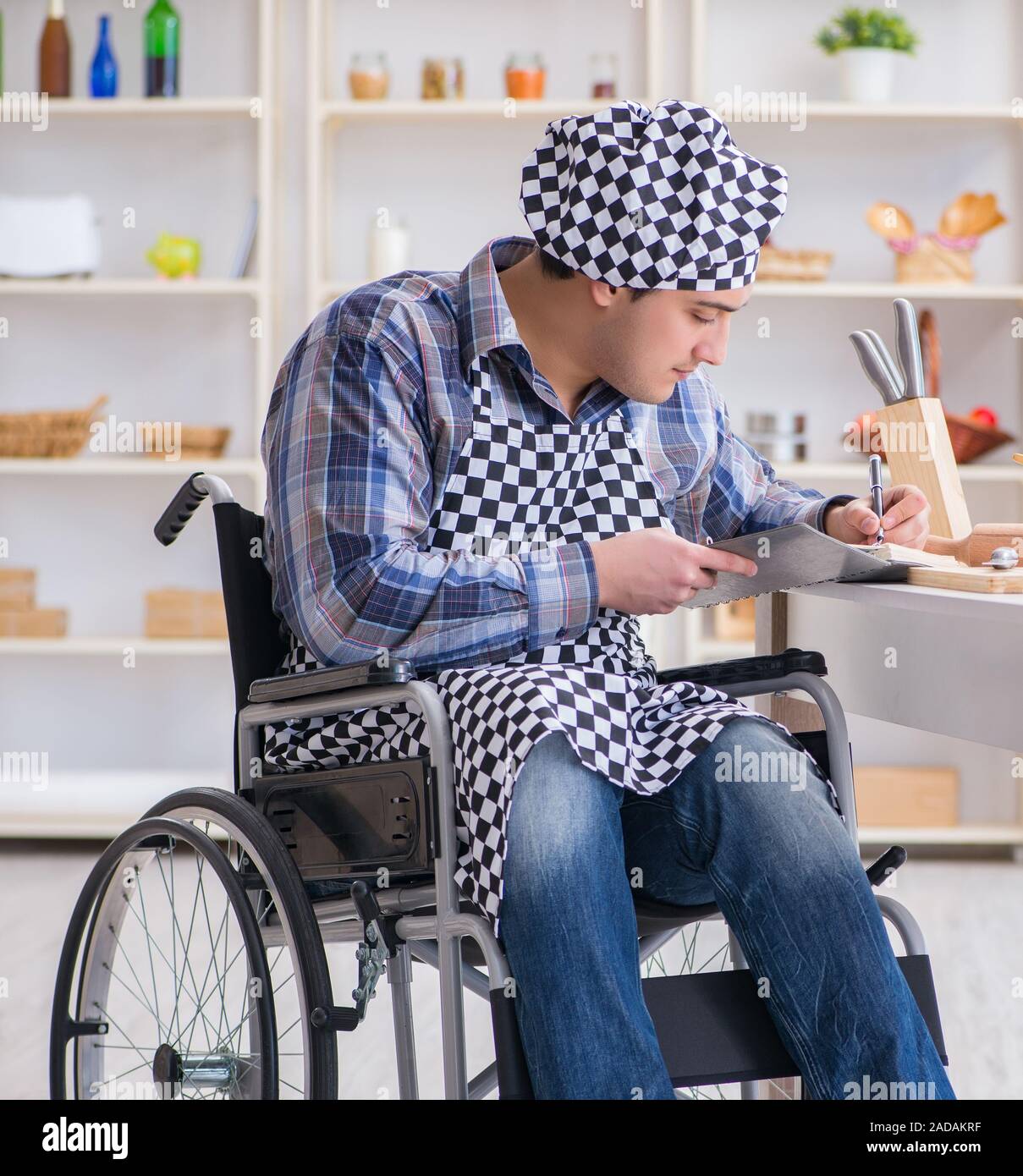 Young man cook book hi res stock photography and images Alamy Young man cook book hi res stock photography and images Alamy