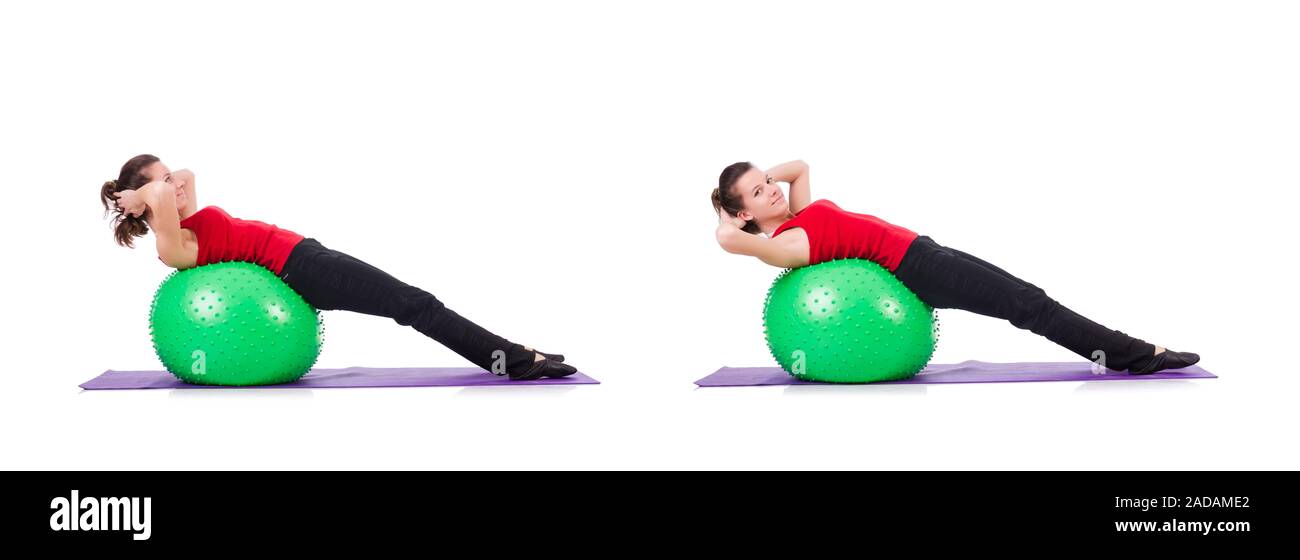 Young woman exercising with swiss ball Stock Photo - Alamy